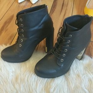 Black and gold Torrid boots